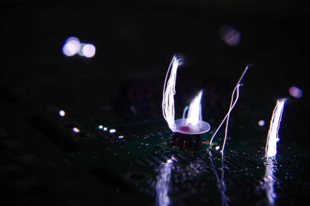 Corona surface treatment produces a large electrostatic discharge which makes it unsuitable for sensitive surfaces or those with electronic components